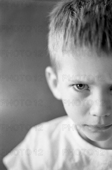 Young Boy With Angry Expression