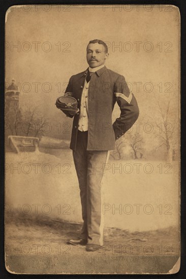 Buffalo Soldier, 25th Infantry, Full-Length Portrait in Uniform Holding Hat, Fort Custer, Montana, USA, by Orlando Scott Goff, William A. Gladstone Collection of African American Photographs, 1880's