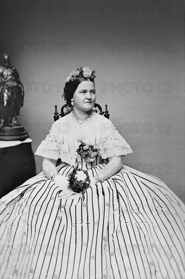 Mary Todd Lincoln, Full-Length Seated Portrait wearing Ball Gown, Brady-Handy Photograph Collection, 1861