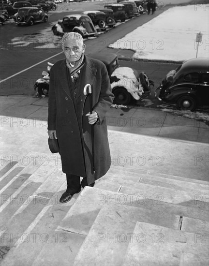 William Andrew Johnson, Former Slave to Former President Andrew Johnson, who was presented with a Silver Handled Cane by President Roosevelt, Portrait on Steps of U.S. Capitol during visit to Washington DC. USA, Harris & Ewing, 1937