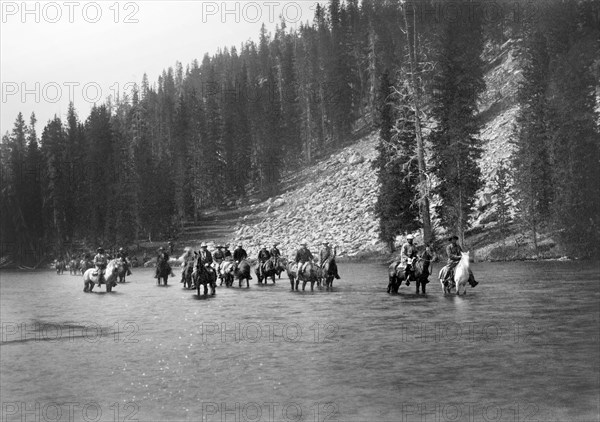 U.S. President Chester A. Arthur and Party Crossing Lewis Fork, Snake River, Yellowstone National Park, Wyoming, USA, Photograph by Frank J. Haynes, 1883