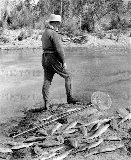 General Anson Stager, part of U.S. President Chester A. Arthur's Expedition Team, fishing at Trout Pond, Yellowstone National Park, Wyoming, USA, Photograph by Frank J. Haynes, 1883