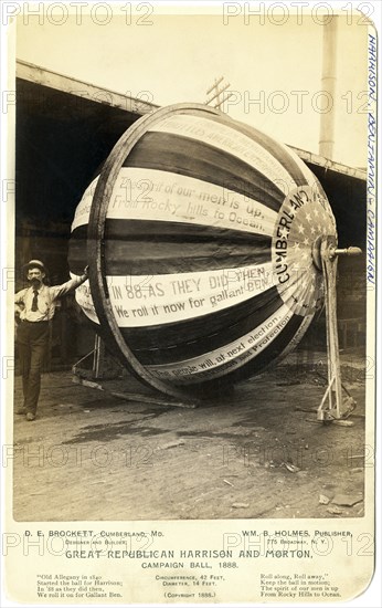 "Great Republican Harrison and Morton campaign ball, 1888", Man, possibly D. E. Brockett, Leaning against Gigantic Campaign Ball that was rolled for Benjamin Harrison during the Presidential Election Campaign of 1888, The Phrase "Get the Ball Rolling" came from a Campaign Publicity Activity that began in 1840, with Rowdy Men and Boys Rolling a Large Ball from town-to-town to bring Attention to their Candidate, Published by William B. Holmes, 1888