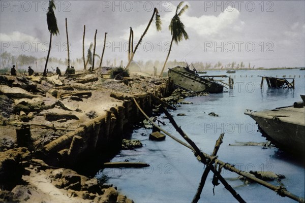 Dead Bodies in Water and on Beach with onlooking U.S. Marines during Battle of Tarawa, Tarawa Atoll, Gilbert Islands, November 1943