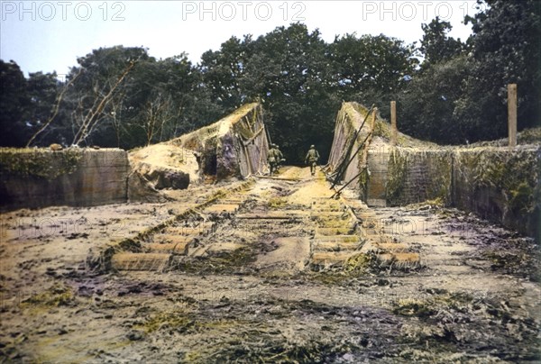 Three U.S. Soldiers Patrolling Occupied Area after D-Day Invasion, Normandy, France, June 1944