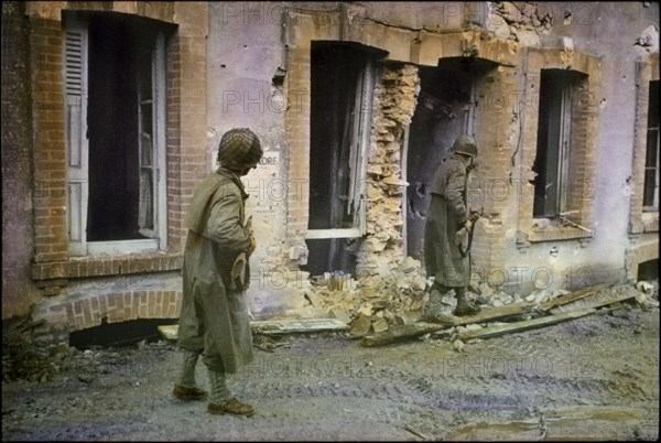 Two U.S. Soldiers Searching through Damaged Buildings, Battle of Normandy, Cherbourg, France, June 1944