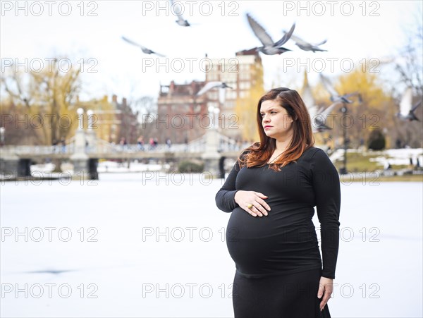 Pregnant Woman Portrait, Birds Flying Overhead, Boston Public Garden, Boston, Massachusetts, USA