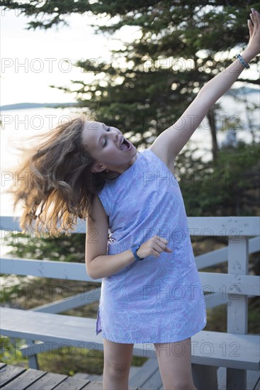 Teenage Girl Dancing on Deck