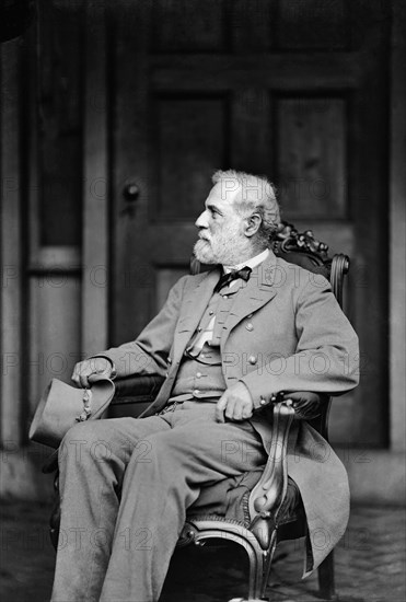 Robert E. Lee (1807-70), American and Confederate Soldier, Commander of Confederate States Army during American Civil War 1862-65, Full-Length Seated Portrait in Uniform he had Worn at the Surrender, Back Porch of his Home, Richmond, Virginia, Photo by Mathew B. Brady, April 16, 1865