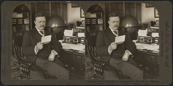 President Theodore Roosevelt at his desk in the White House, Washington, D.C., USA, Stereo Card, R.Y. Young, American Stereoscopic Co., 1903