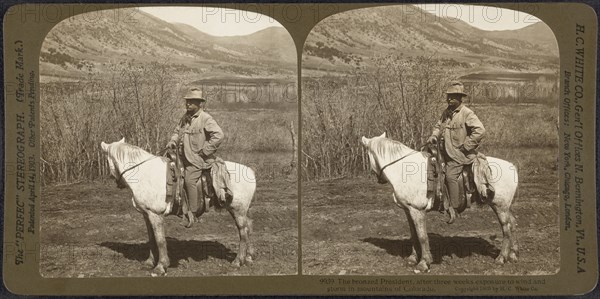 President Theodore Roosevelt on Horseback, Mountains in background, The bronzed President, after three weeks Exposure to Wind and Storm in Mountains of Colorado, USA, Stereo Card, H.C. White Co., June 1905