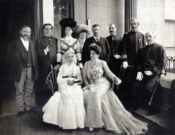 U.S. President Theodore Roosevelt in group portrait with Illinois Governor Richard Yates (left), Illinois Lieutenant Governor William Northcott (far left), three Unidentified Military Officers and Four Women, Illinois, USA, Photograph by Guy R. Mathis, October 1901