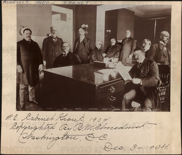 U.S. President Theodore Roosevelt seated at Desk Reading, Surrounded by Superimposed Images of his Cabinet Members, Washington, D.C., USA, Photograph by Barnett McFee Clinedinst, December 3, 1904