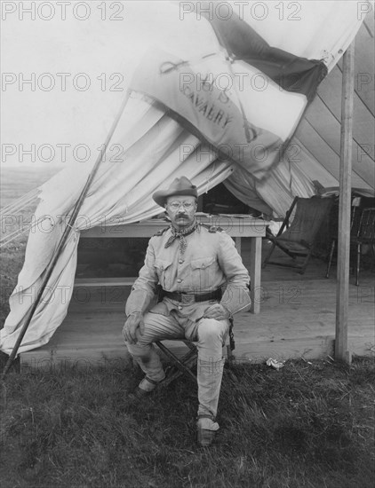 Colonel Theodore Roosevelt, Full-Length Seated Portrait in Military Uniform, Montauk, New York, USA, Photograph by Siegel-Cooper Co., September 1898