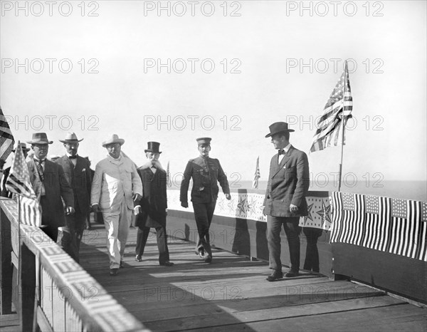 U.S. President Theodore Roosevelt with Group of Men on Wharf upon Arrival, Ponce, Puerto Rico, Photograph by Waldrop Photographic Company, November 21, 1906