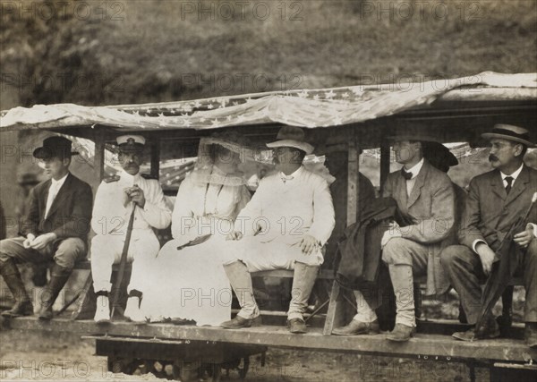 U.S. President Theodore Roosevelt and Wife Edith Roosevelt inspecting Canal Work from Narrow Gauge Train, L-R: Engineer J. G. Holcombe, Surgeon General Rear Admiral Presley Marion Rixey, Edith Roosevelt, President Roosevelt, unidentified man, John F. Stevens Balboa Heights, Panama, Underwood & Underwood, November 1906