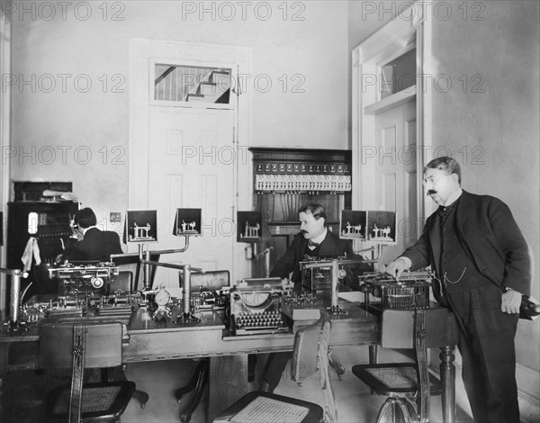 White House Telegraph Office and Staff during Theodore Roosevelt's administration, Washington, D.C., USA, Photograph by Barnett McFee Clinedinst, 1902