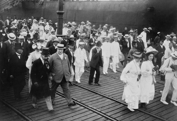 U.S. Secretary of War William Howard Taft with group of Dignitaries Leaving Dock at Yokohama, Japan, during Diplomatic Mission, Photograph by Burr McIntosh, July 1905