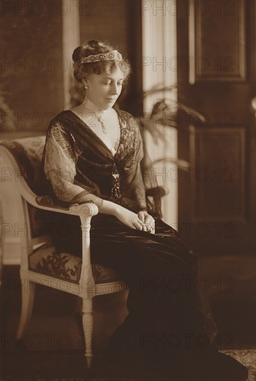 Helen Herron Taft (1861-1943), First Lady of the United States 1909-1913 as wife of U.S. President William Howard Taft, Full-Length Seated Portrait in Elegant Evening Gown and Tiara, Photograph by Harris & Ewing, March 1912