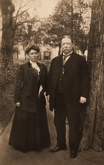 U.S. President William Howard Taft and First Lady Helen Herron Taft, Full-Length Portrait Standing in Garden, Photograph by Brown Brothers, 1909