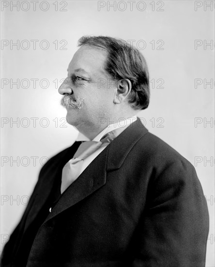William Howard Taft (1857-1930), 27th President of the United States 1909-1913, 10th Chief Justice of the United States 1921-1930, Half-Length Profile Portrait as U.S. Secretary of War under U.S. President Theodore Roosevelt,  Photograph by Harris & Ewing, 1906