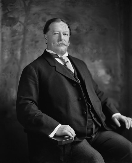 William Howard Taft (1857-1930), 27th President of the United States 1909-1913, 10th Chief Justice of the United States 1921-1930, Three-Quarter Length Seated Portrait as U.S. Secretary of War under U.S. President Theodore Roosevelt,  Photograph by Harris & Ewing, 1906