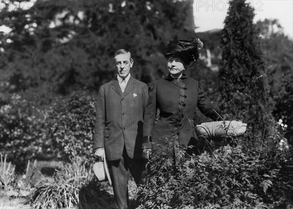 Princeton University President Woodrow Wilson with his First Wife Ellen Axon Wilson, Three-Quarter Length Portrait in Garden, Princeton, New Jersey, USA, photograph by American Press Association, 1910