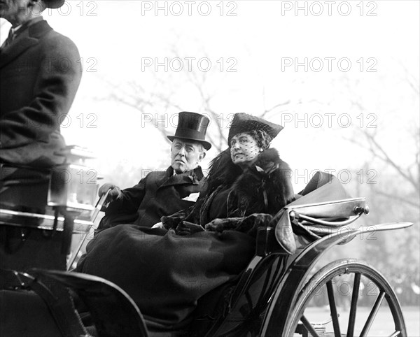 Former U.S President Woodrow Wilson and his Wife Edith Bolling Wilson Riding in Horse-drawn Carriage to Burial of Unknown Soldier, Armistice Day, Photograph by National Photo Company, November 11, 1921