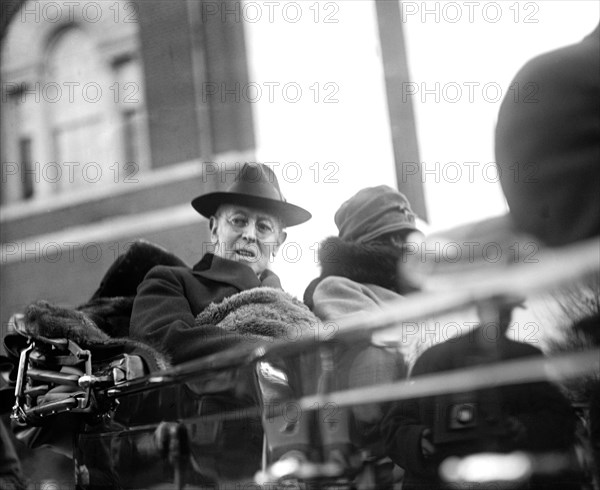Former U.S. President Woodrow Wilson and his Second Wife Edith Wilson in back seat of Convertible Automobile, Washington, D.C. USA, National Photo Company, 1923