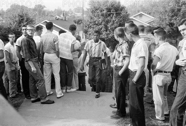 African American Boy Walking through Crowd of White Boys during Period of Violence Related to School Integration, Clinton, Tennessee, USA, photograph by Thomas J. O'Halloran, September 1956