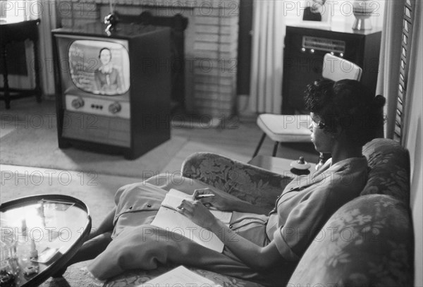 African-American High School Girl being Educated via Television during period that Schools were Closed to Avoid Integration, Little Rock, Arkansas, USA, photograph by Thomas J. O'Halloran, September 1958
