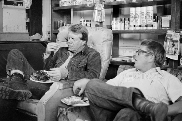 Democratic U.S. Presidential Nominee Jimmy Carter eats with his brother, Billy Carter, during a campaign stop at Billy's Gas Station, Plains, Georgia, USA, photograph by Thomas J. O'Halloran, September 10, 1976