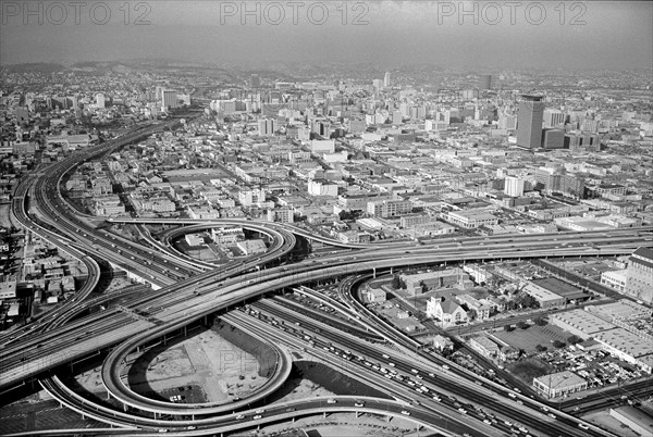 High Angle View of Los Angeles, California, USA, Freeways 10 and 110 in foreground, Cityscape in Background, photograph by Thomas J. O'Halloran, July 1965