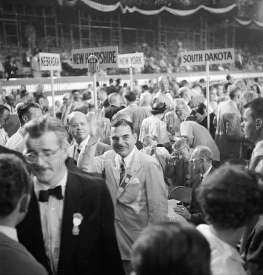 Thomas E. Dewey, Governor of New York, waving from Floor of Convention Hall during Republican National Convention, International Amphitheatre, Chicago, Illinois, USA, photograph by Thomas J. O'Halloran, July 1952