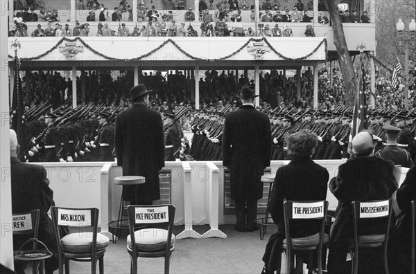 Rear View of U.S. President Dwight Eisenhower and U.S. Vice President Richard Nixon Reviewing Inauguration Parade, First Lady Mamie Eisenhower and Second Lady Pat Nixon seated right, Washington, D.C., USA, photographer Thomas J. O'Halloran, Warren K. Leffler, January 21, 1957