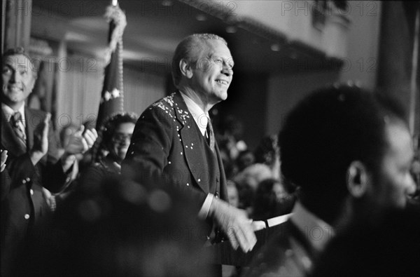 U.S. President Gerald Ford, covered with Confetti, smiles at Crowd after his arrival for 1st Presidential Debate with Democratic Presidential Nominee Jimmy Carter, Philadelphia, Pennsylvania, USA, photograph by Marion S. Trikosko, September 23, 1976