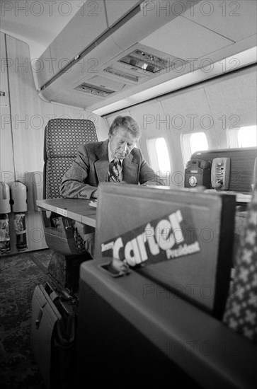 Democratic Presidential Nominee Jimmy Carter Working aboard the "Peanut One" Campaign Airplane, photograph by Thomas J. O'Halloran, September 13, 1976