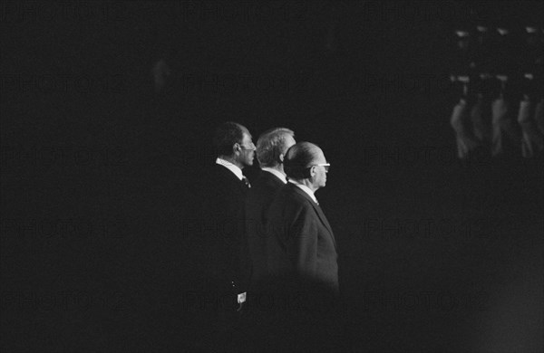 U.S. President Jimmy Carter, Egyptian President Anwar Sadat, and Israeli Prime Minister Menachem Begin reviewing Marines during Camp David Accords, Camp David, Maryland, USA, photograph by Marion S. Trikosko, September 6, 1978