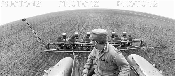 Farmer Tilling Field, Illinois, USA, photograph by Thomas J. O'Halloran, April 1971