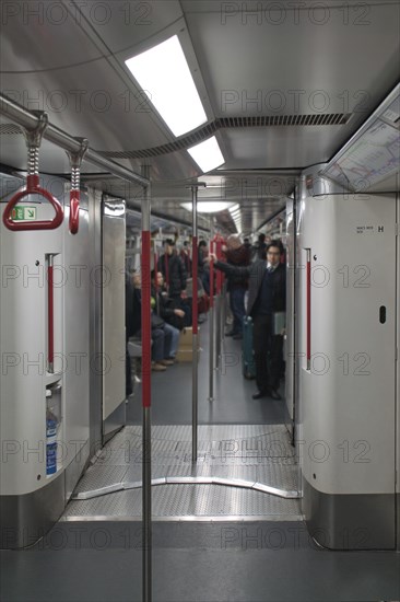 Passengers in Subway Car, Hong Kong, China