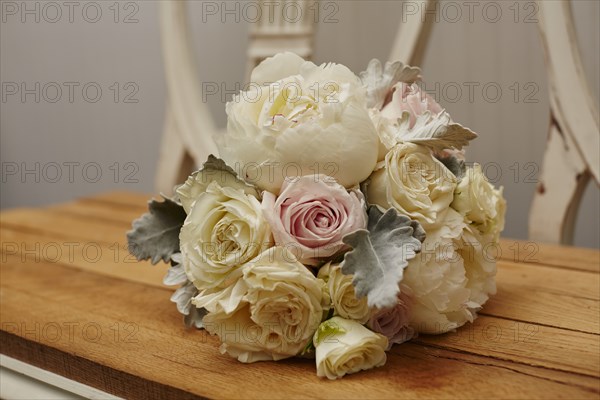 Bouquet of Flowers on Wood Bench