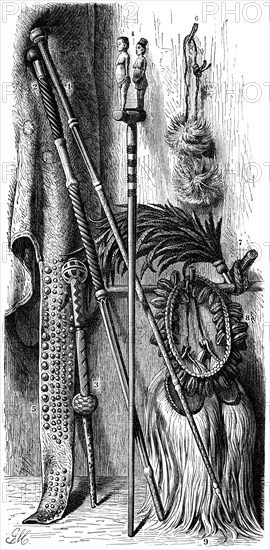 South African Native items: 1, 2 Chieftan's Staffs; 3, Dancing Staff; 4, Fetish Stick; 5, Mantle Cloth with Trailing Ornamentation; 6, Fly Brush worn on Head; 7, Plume of Feathers; 8, Collar for Dancing with Rattles; 9, Knee Regalia, Illustration from the book, "Volkerkunde" by Dr. Friedrich Ratzel, Bibliographisches Institut, Leipzig, 1885