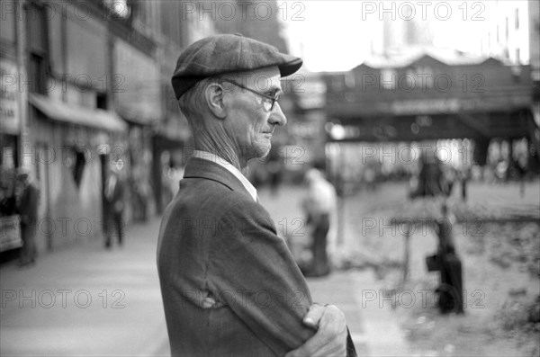 Elderly Man watching Subway Construction