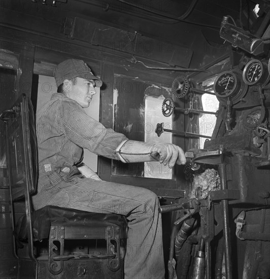 Fireman C.P. Fryer in his cab on the Atchison