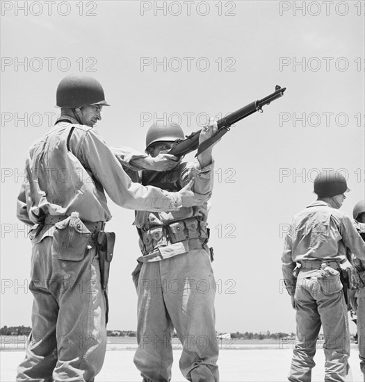 Soldier Learning how to use Thompson Submachine Gun