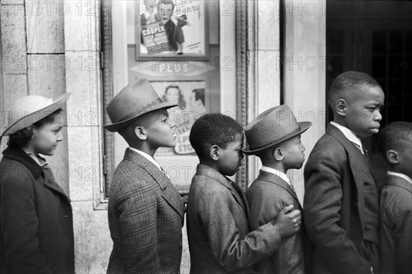 Half-Length Profiles of Children in front of Moving Picture Theater