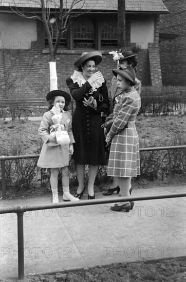 Group of People talking in Front of Church