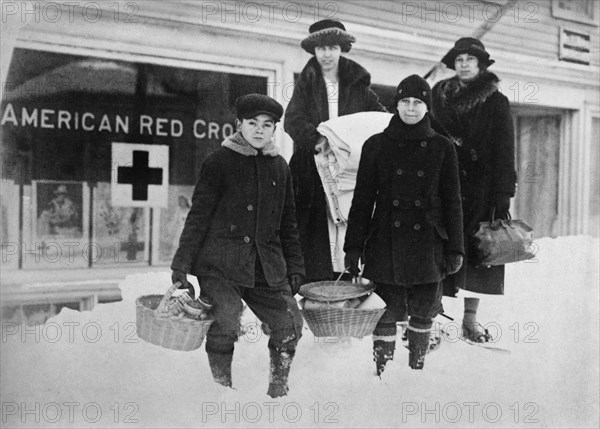 Small Group of Volunteers leaving Red Cross Headquarters with Supplies for the sick during Influenza Epidemic