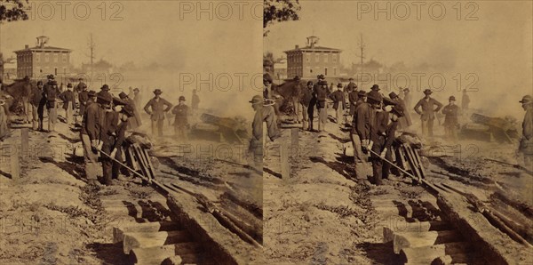 Group of Union Soldiers tearing up Confederate Railroad Tracks before evacuating Atlanta