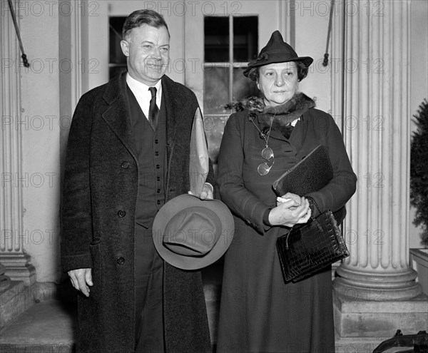 Warren Madden of the National Labor Relations Board and U.S. Secretary of Labor Frances Perkins leaving White House after discussing with U.S. President Franklin Roosevelt a Labor Dispute at Merrimac Mills at Huntsville